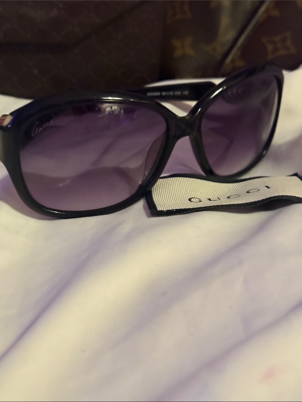 Gucci Black Frame Sunglasses with Purple Gradient Lenses